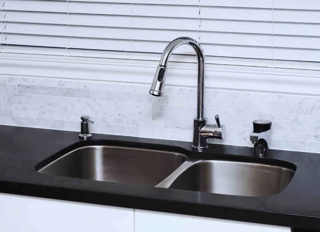 Changement Mitigeur d'évier Tiercé